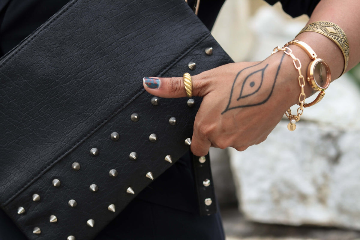 Close-up of Alchemy studs and leather grain
