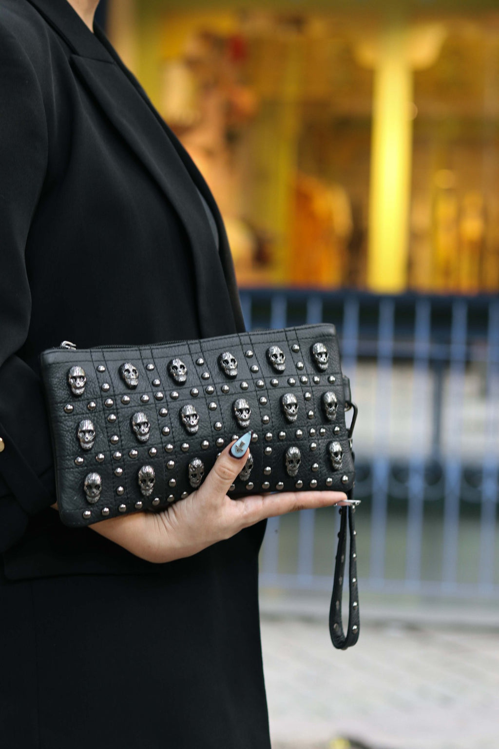 Catacomb pouch held, strap hanging