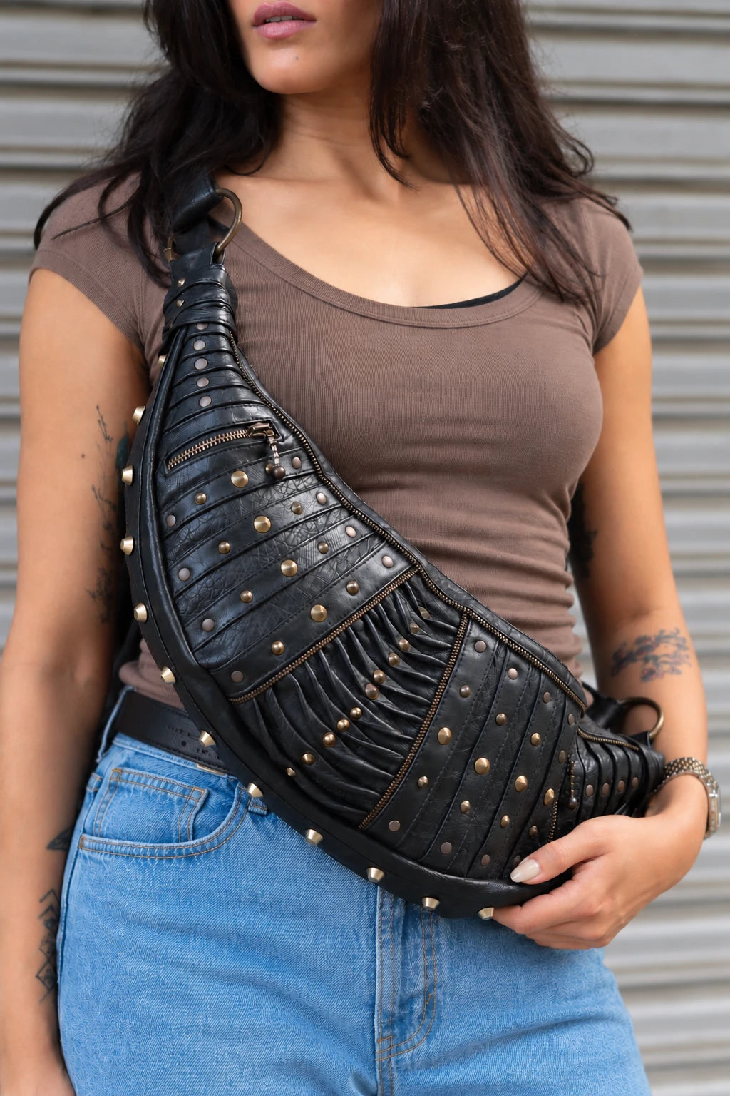 Hollow Moon sling bag worn across the body