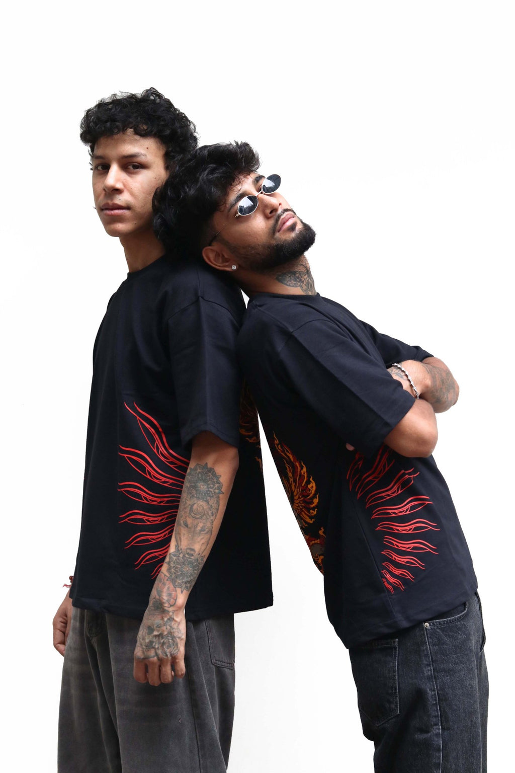 Two models in the Garuda tee, back to back
