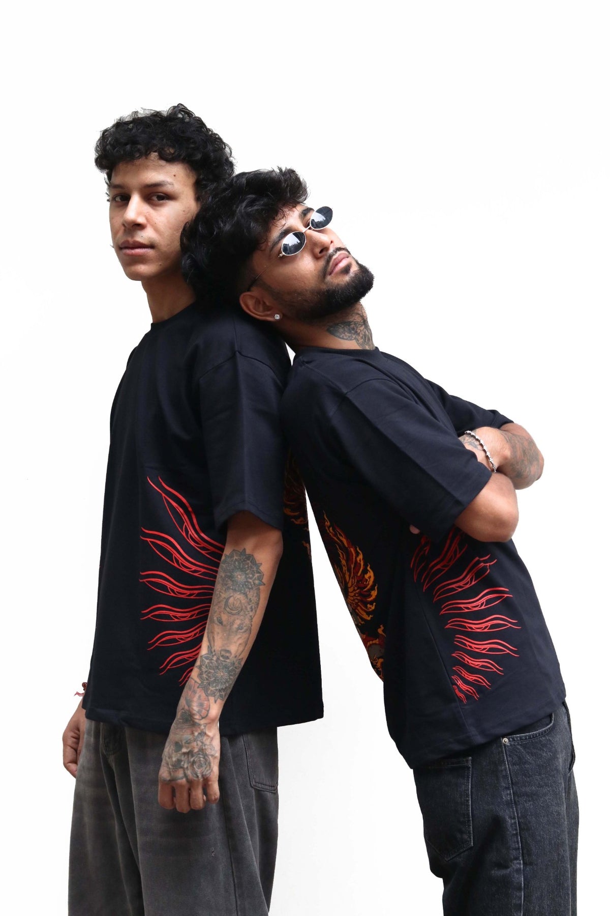 Two models in the Garuda tee, back to back